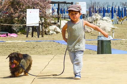 Boy with Dachshund on Lido di Venezia