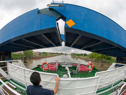 LA BELLA VITA passes under a drawbridge