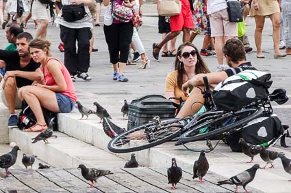 Couple with bicycle in Venice