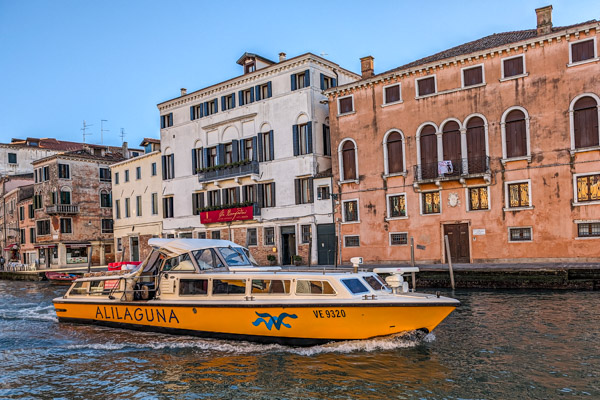 Alilaguna Orange Line airport boat in Cannaregio Canal.