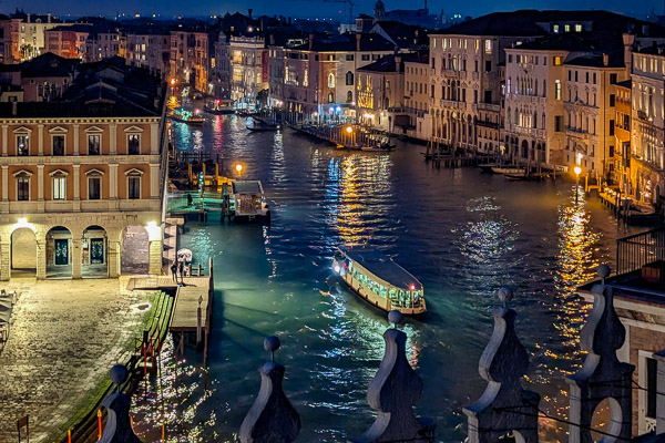 Rialto Food markets and the Grand Canal with a vaporetto.